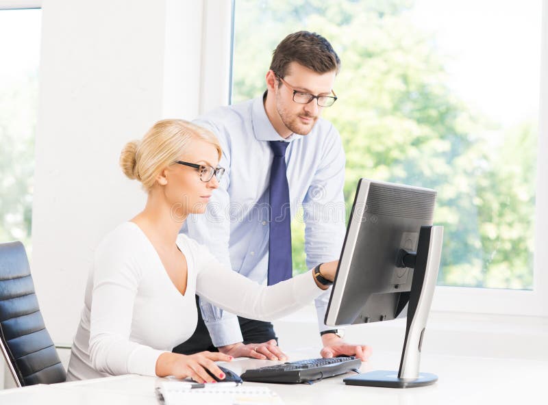 Office workers in formalwear working in office royalty free stock images Office workers in formalwear working in office royalty free stock images