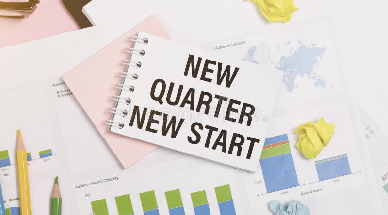 Workplace with coffee cup, calculator, stationery and plant. Text NEW MONTH NEW START on white notepad page. Table desk top royalty free stock photos