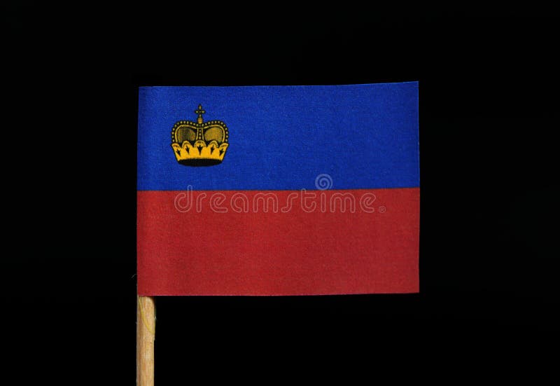 A Official Flag of Liechtenstein on Toothpick on Black Background. Horizontal Bicolour Blue Red; Charged with a Gold Crown Stock Photo - Image of european, 136061602