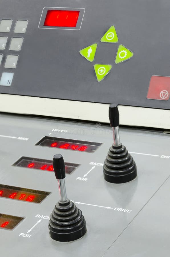 Offset machine press print at control unit table stock photo