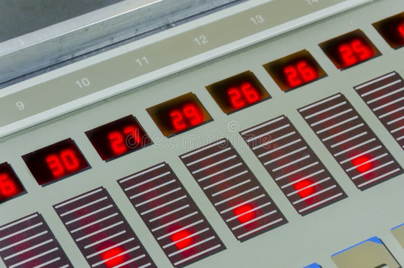 Offset machine press print at control unit table stock photography