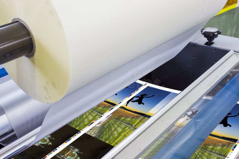 Offset machine press print run at table stock image