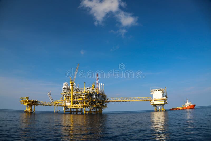 Offshore oil and gas production and exploration business. Production oil and gas plant and main construction platform in the sea. Energy business stock photo Offshore oil and gas production and exploration business. Production oil and gas plant and main construction platform in the sea. Energy business stock photo