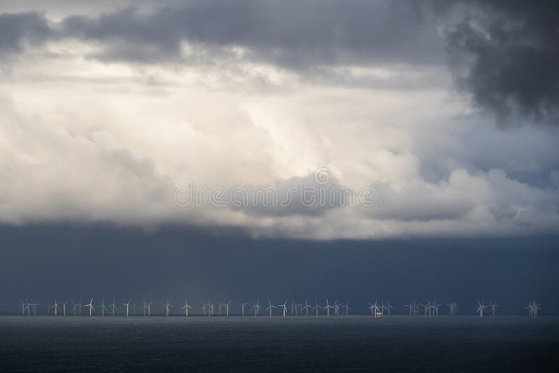 Offshore wind farm. A large wind farm with a large number of wind turbines.