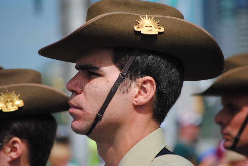 Melbourne, Australia - JAN 26 2009: Unidentified Australian Army Officer at the Australia Day Parade in Melbourne. Crowds watch the approaching Parade participants. Melbourne, Australia - JAN 26 2009: Unidentified Australian Army Officer at the Australia Day Parade in Melbourne. Crowds watch the approaching Parade participants.