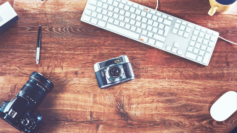 Creative office / agency working with photo cameras - instagram style analog film look. Creative office / agency working with photo cameras - instagram style analog film look