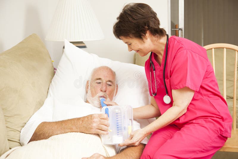 Home health nurse helps a senior patient with his respiratory therapy. Home health nurse helps a senior patient with his respiratory therapy.