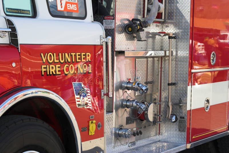 Closeup of fire truck ready to fight a fire, commanded by volunteers. Closeup of fire truck ready to fight a fire, commanded by volunteers