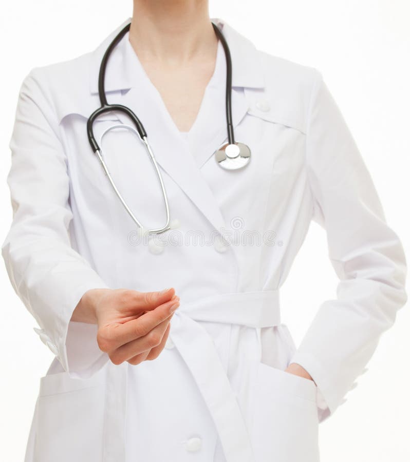 Oigenkännlig doktor som ut kastar ett förslag på en kissa fotografering för bildbyråer