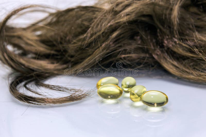 Oil Capsules for hair stock photo. Image of beautiful 66090376