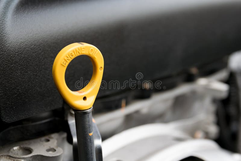 The Oil Dipstick of a Car Engine Stock Photo Image of automobile, machine 75339952