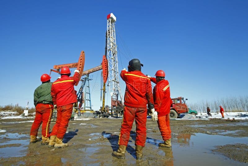 Oil Drilling Exploration, the Oil Workers are Working Stock Image
