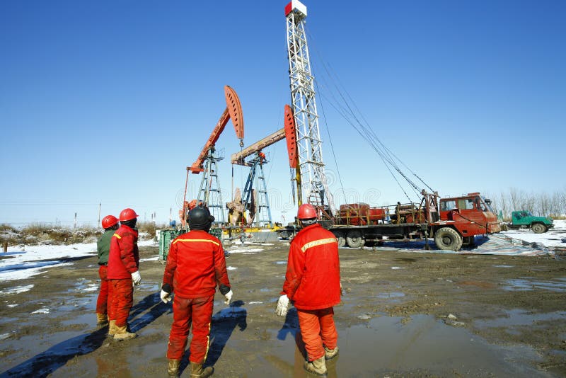 Oil Drilling Exploration, the Oil Workers are Working Stock Image