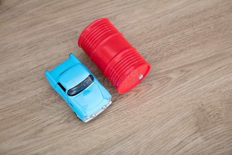 Oil drum and car model stock photo. Image of barrel 253334406