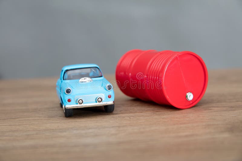 Oil drum and car model stock photo. Image of life, model 253334420