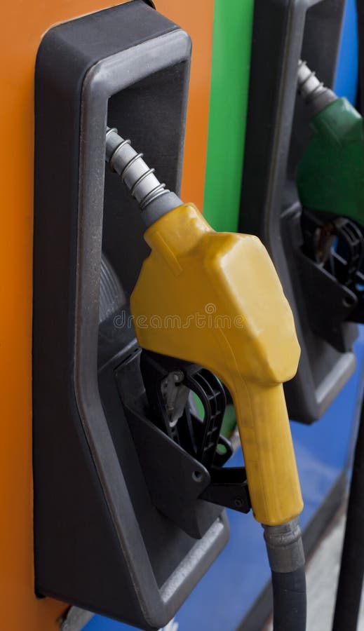 Oil handle in gas station stock image. Image of hose 29868603