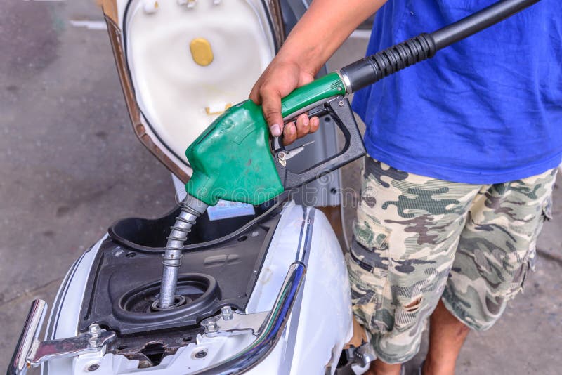 Motorcycle Oil Refill To Tank Stock Photo Image of benzine, flamable