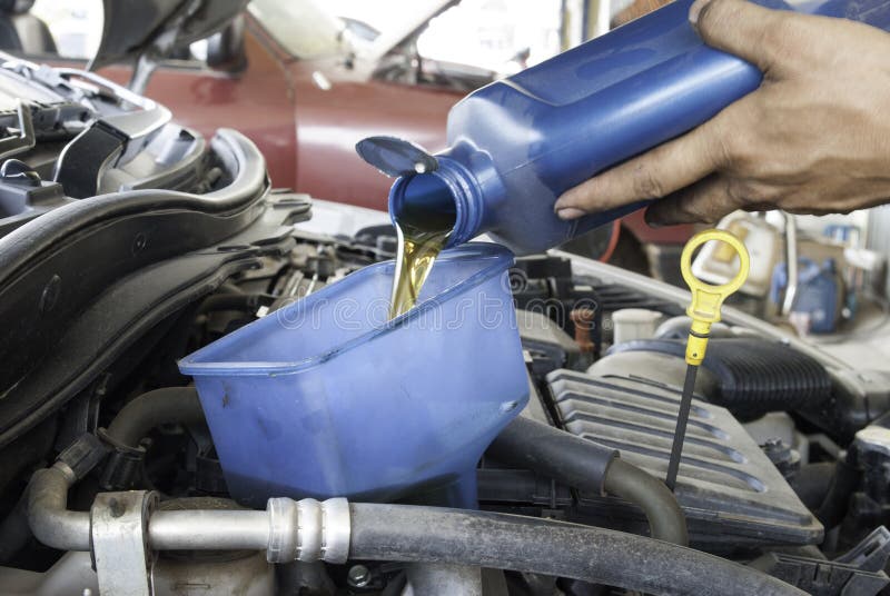 Oil inspection and refill stock photo. Image of inspection 53062804