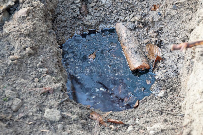 Oil Leaking from the Soil, Heating Oil from a Previous Oil Spill