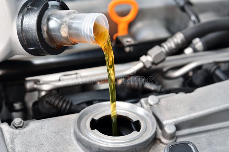 Pouring Oil into Car Engine Stock Photo Image of lubricant