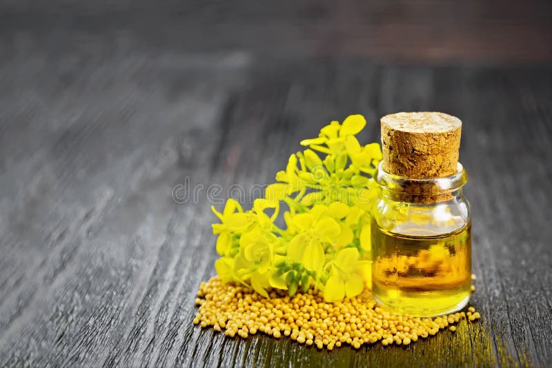 Oil Mustard in Bottle the Dark Board Stock Photo - Image of flower,  horizontal: 183050350