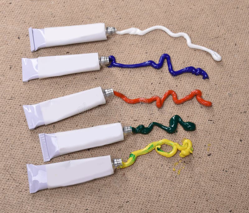 Oil Paints Squeezed Out of Tubes on a Wooden Palette Stock Image