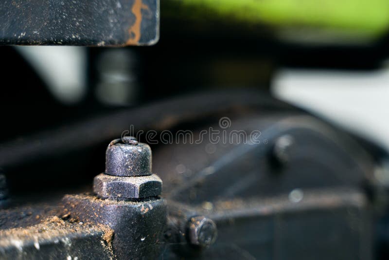 Oil Pressure Sensor on the Body of the Walkbehind Tractor Closeup