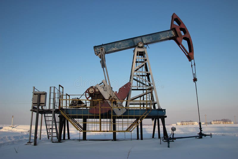 Oil Production in the Winter. Stock Photo Image of reservoir, energy