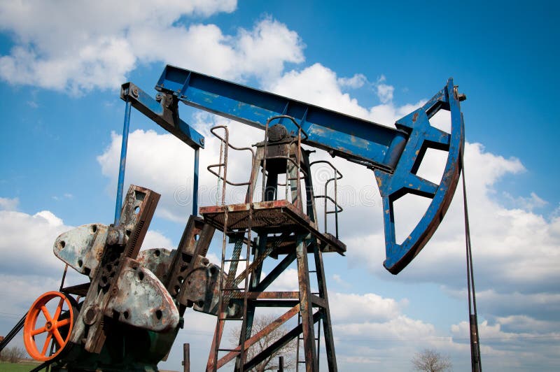 Oil pump jack royalty free stock photo