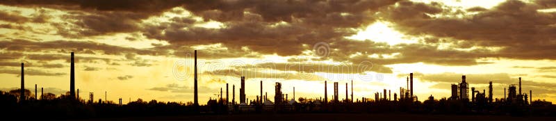 Oil refinery at sunset