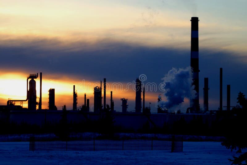 Oil refinery at sunset