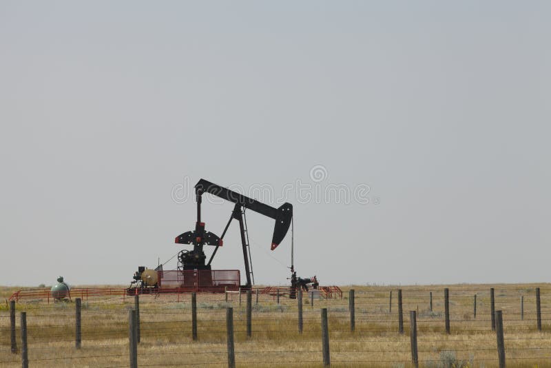 Prairie oil drilling rig stock photo. Image of machinery 11217046