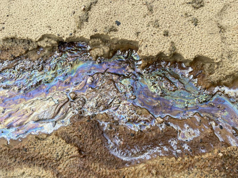 Oil spills on the sand stock image. Image of water, disaster 220402775