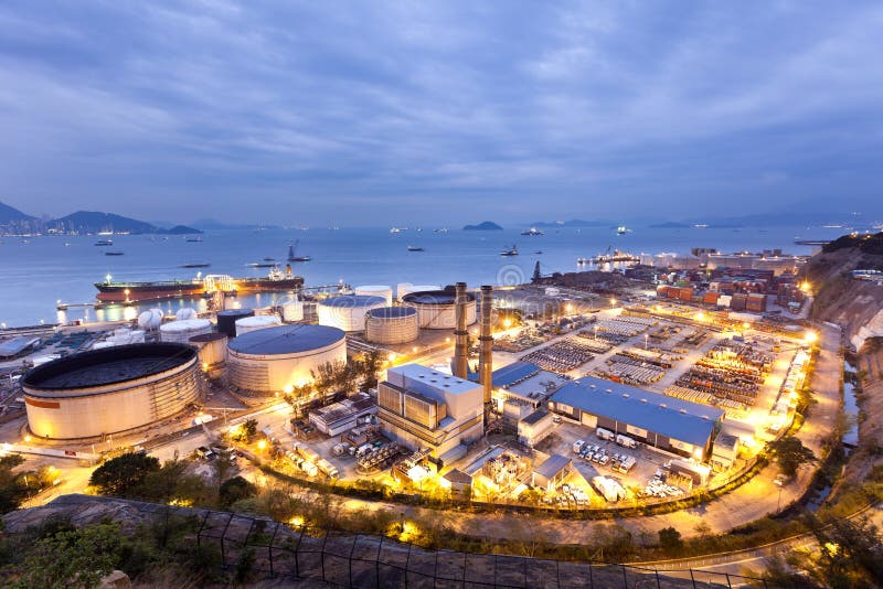 Oil tanks industry scene at night