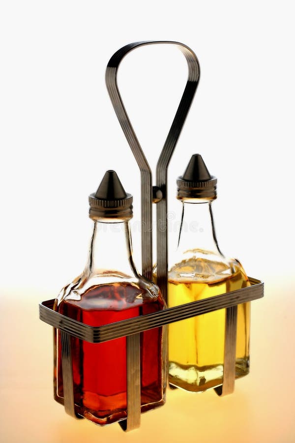 Oil And Vinegar Bottles In Metal Rack Stock Image Image of frame