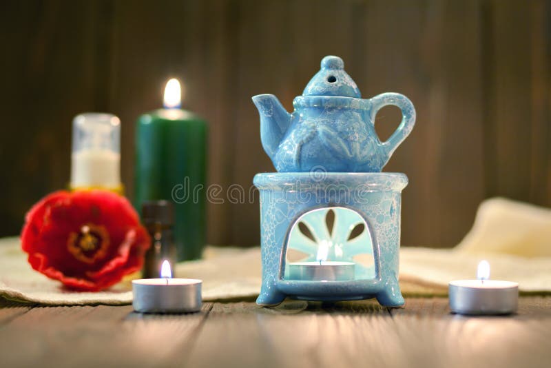 The Oil Warmer in the Candles Stock Photo Image of health, flower