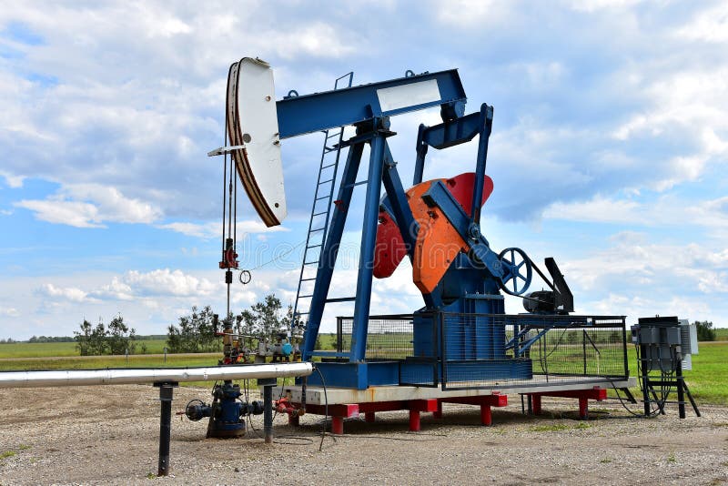 Oil Well Pump Jack stock image. Image of outdoors, pipe 125459833