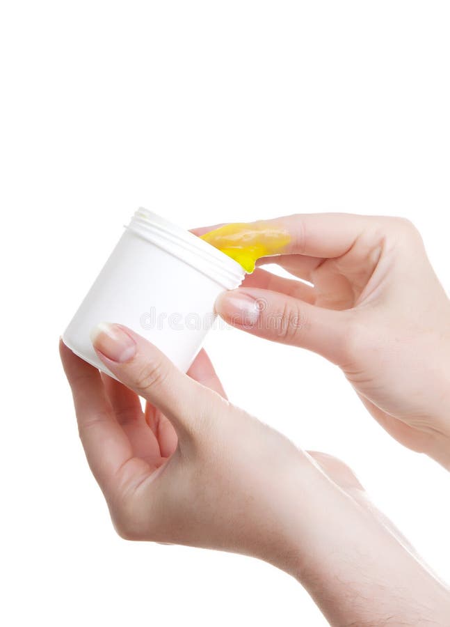 Ointment in hand royalty free stock images