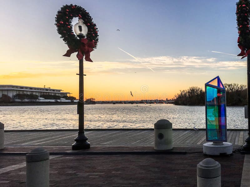 Christmas wreaths and sunrise on the Potomac river in Georgetown. Christmas wreaths and sunrise on the Potomac river in Georgetown