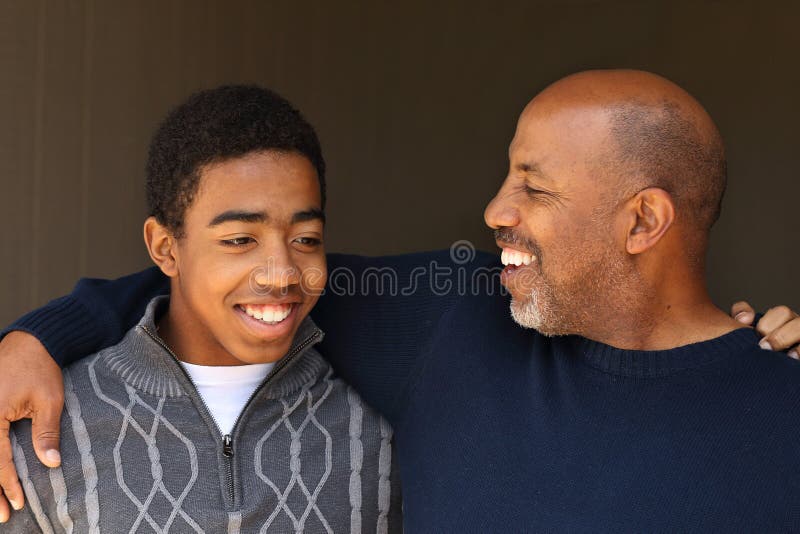 African American father and teenage son. African American father and teenage son