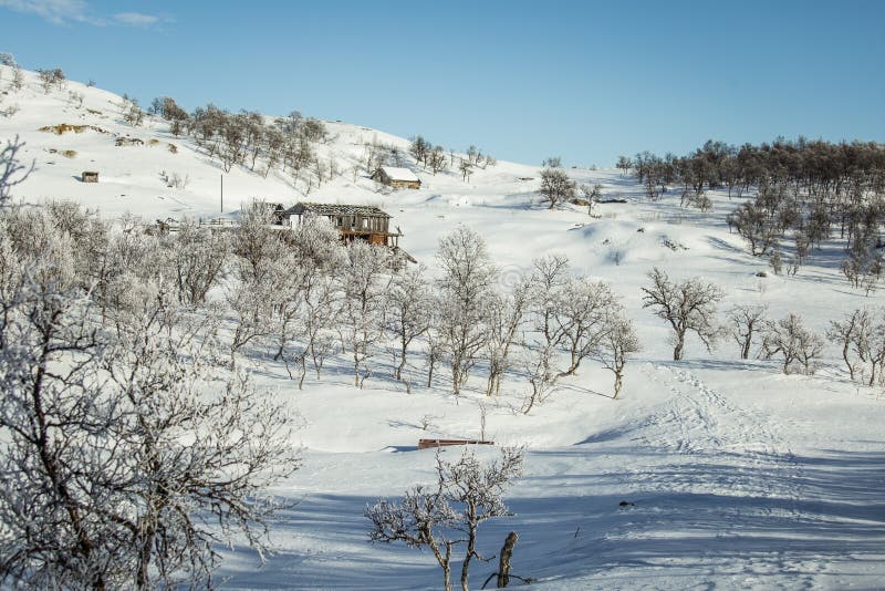 An old, abandoned copper mine building in the snowy landscape stock image An old, abandoned copper mine building in the snowy landscape stock image