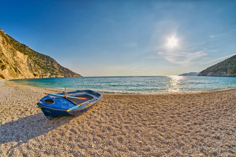 Old Abandoned Fishermen Boat at Sunset Myrtos Beach in Kefalonia, Greece