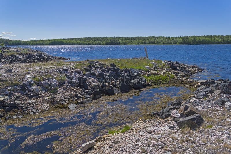 Old abandoned quarry on the White Sea stock image Old abandoned quarry on the White Sea stock image