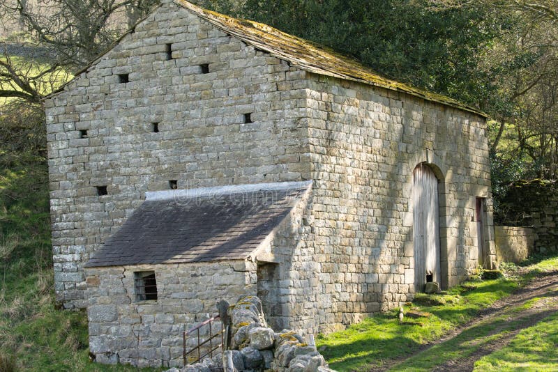 Old Abandoned Rural Limestone Barn.