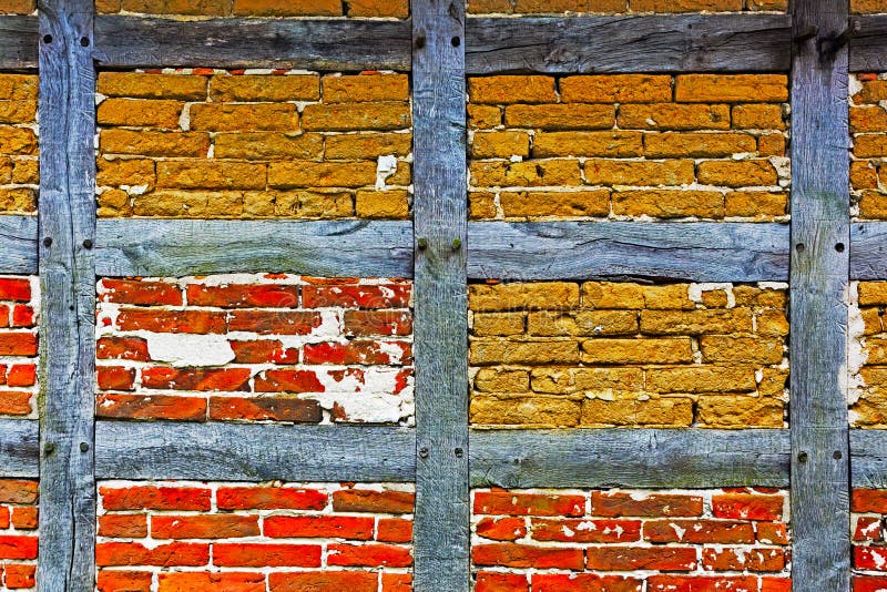 Old adobe and brick wall of the half timbered house