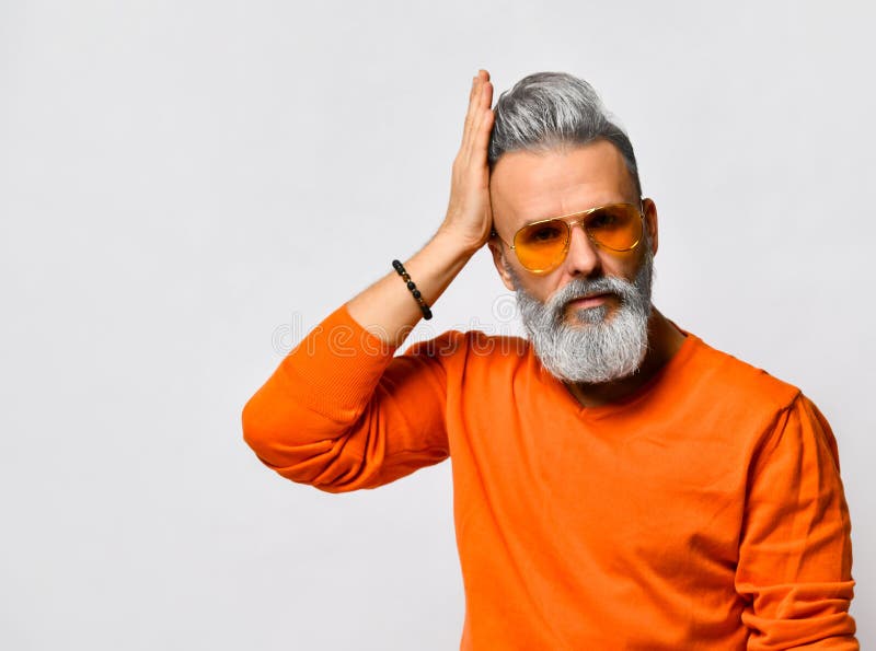 Old-aged Man in Orange Sweater and Sunglasses, Bracelet. Fixing His  Hairstyle, Posing Isolated on White Background. Close Up Stock Photo -  Image of looking, mustache: 178084926