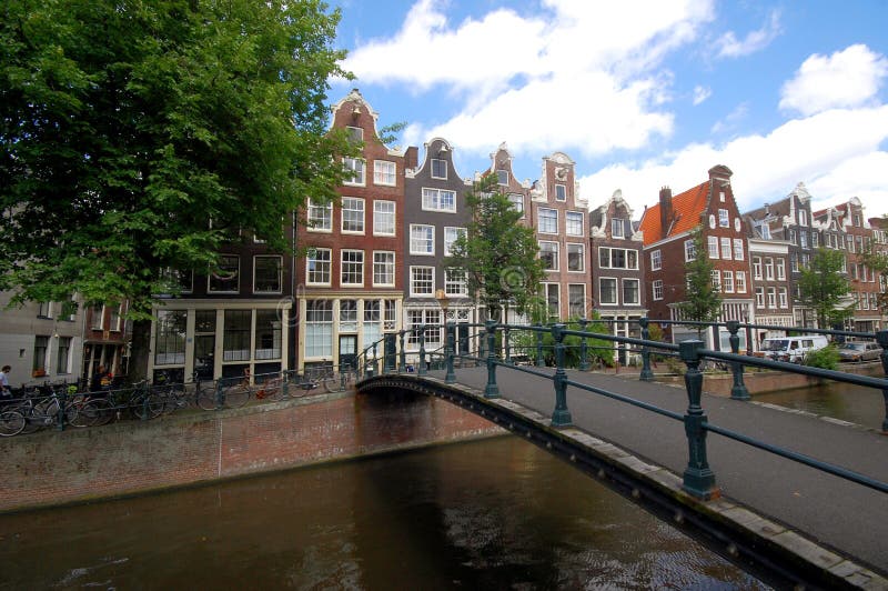 Old Amsterdam Houses Along Canal Stock Image - Image of amsterdam