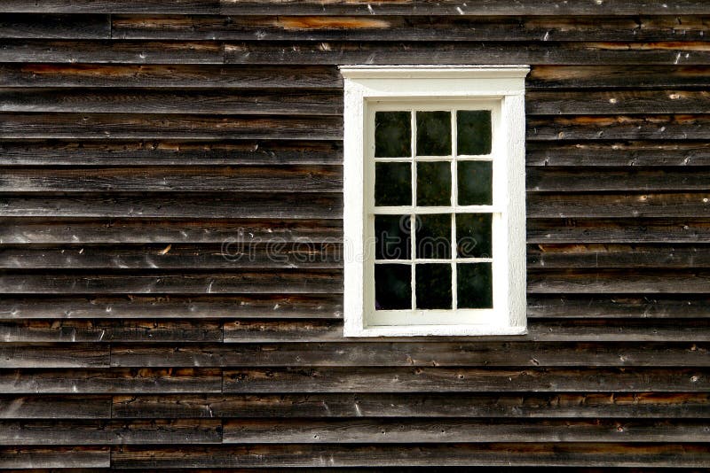 Old Antique Sash Window on a Historic House Wall