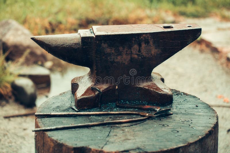 Old anvil and tongs stock photos Old anvil and tongs stock photos