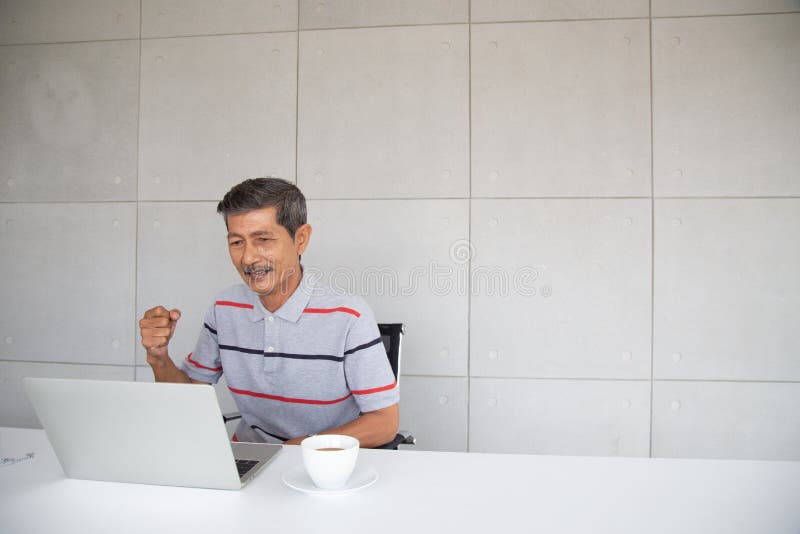 Old Asian man happy and smile with his success royalty free stock photo Old Asian man happy and smile with his success royalty free stock photo